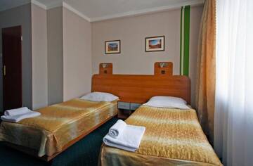 Фото номера Трехместный номер Отель Hotel Orion г. Сосновец 5