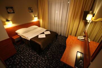 Фото номера Двухместный номер с 1 кроватью или 2 отдельными кроватями Отель Hotel Orion г. Сосновец 2